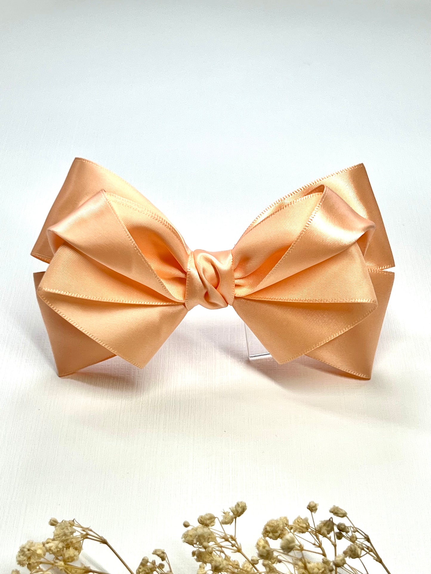 ✨ Elegant & timeless ✨ Our handcrafted satin wedding hair clips are designed to add a touch of luxury to your special day. Available in a stunning range of colors including classic white.