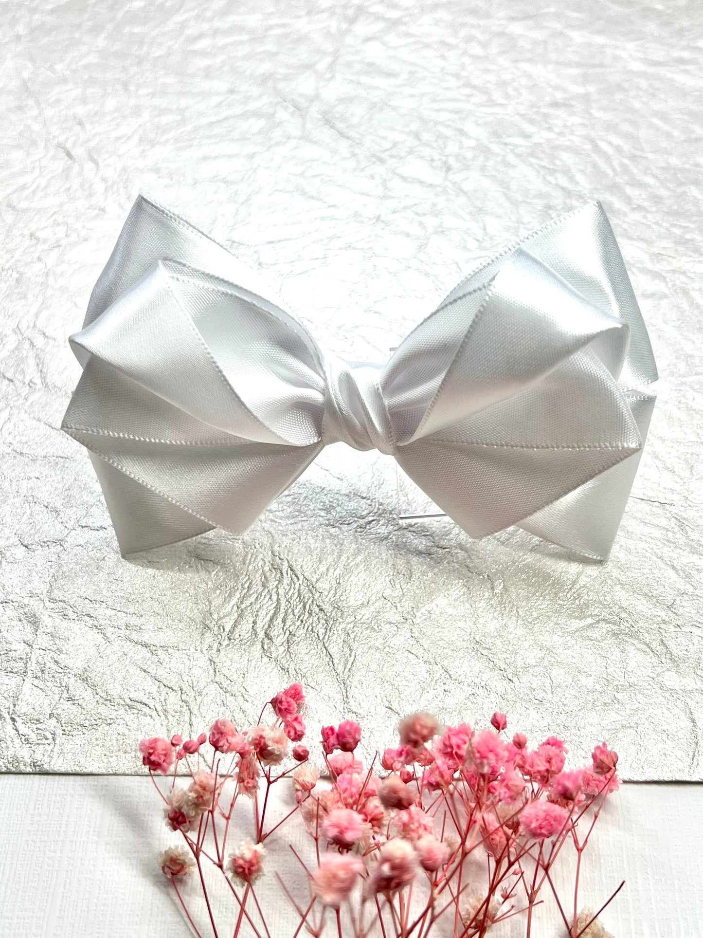 ✨ Elegant & timeless ✨ Our handcrafted satin wedding hair clips are designed to add a touch of luxury to your special day. Available in a stunning range of colors including classic white.