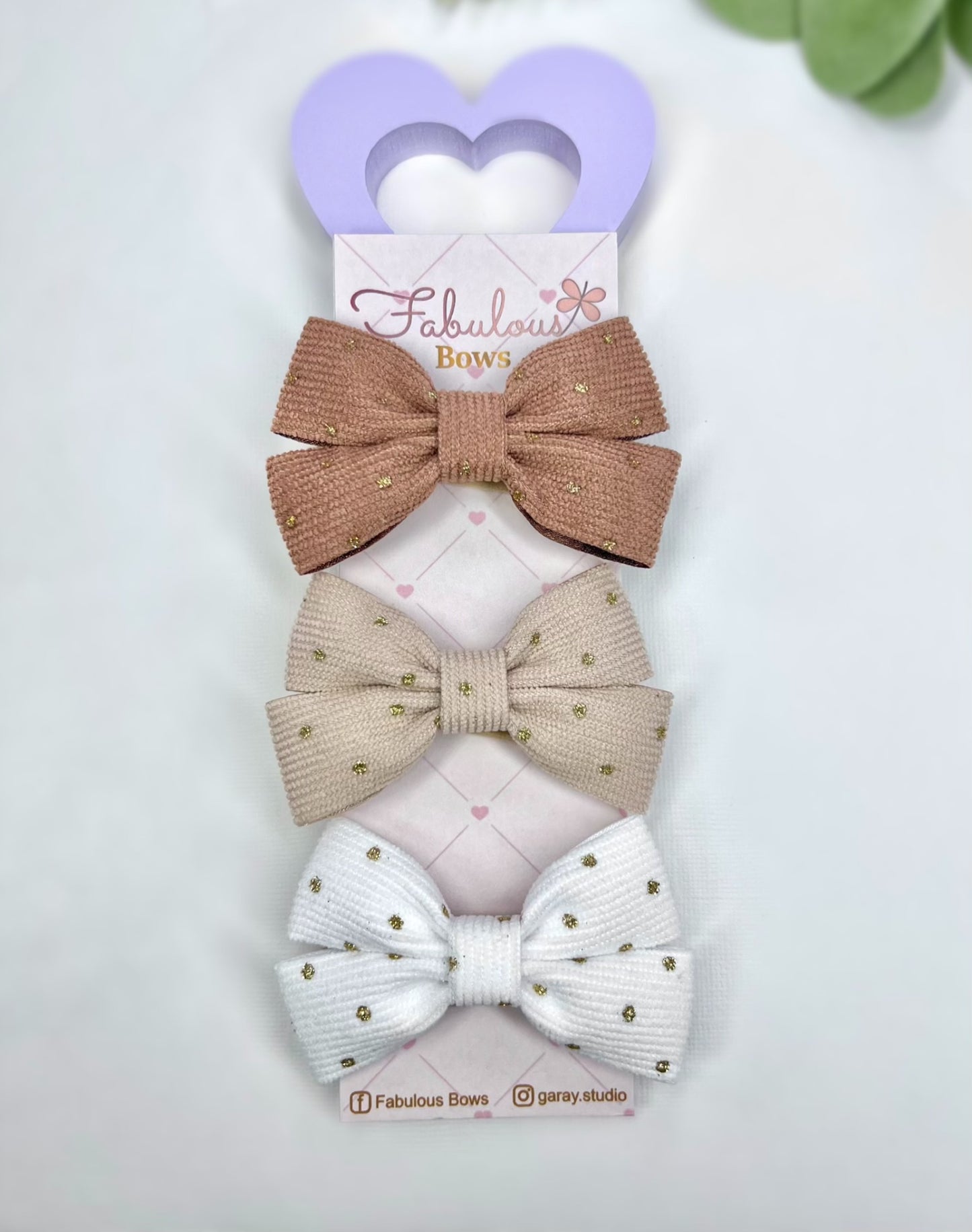 ✨ Sparkle and shine with our gold dusted bow collection.