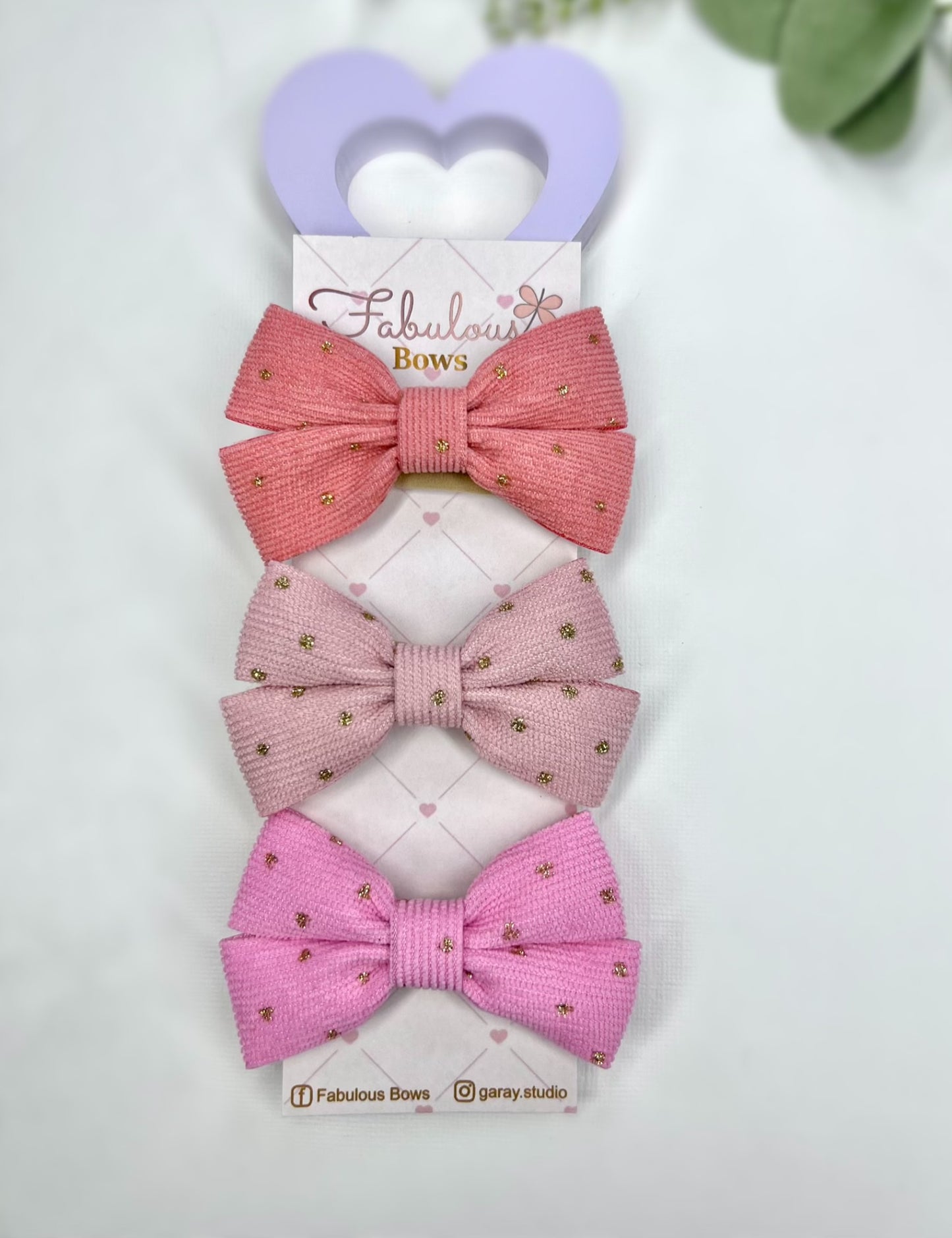 ✨ Sparkle and shine with our gold dusted bow collection.